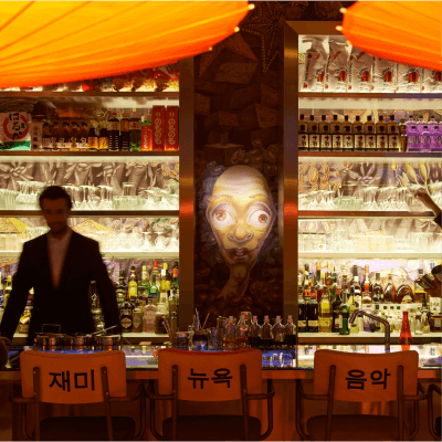 Miss Ko - Photograph of the bar with illustrated tapestry